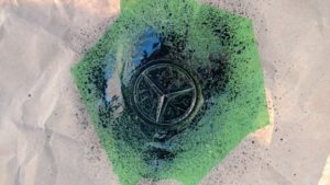 Blacking out the emblem, first coat