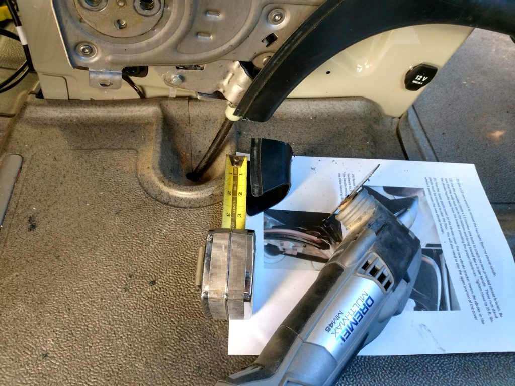 Cutting the front parking brake handle cover
