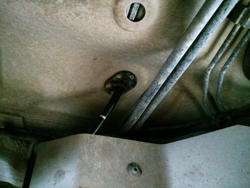 Parking brake housing from underneath the van