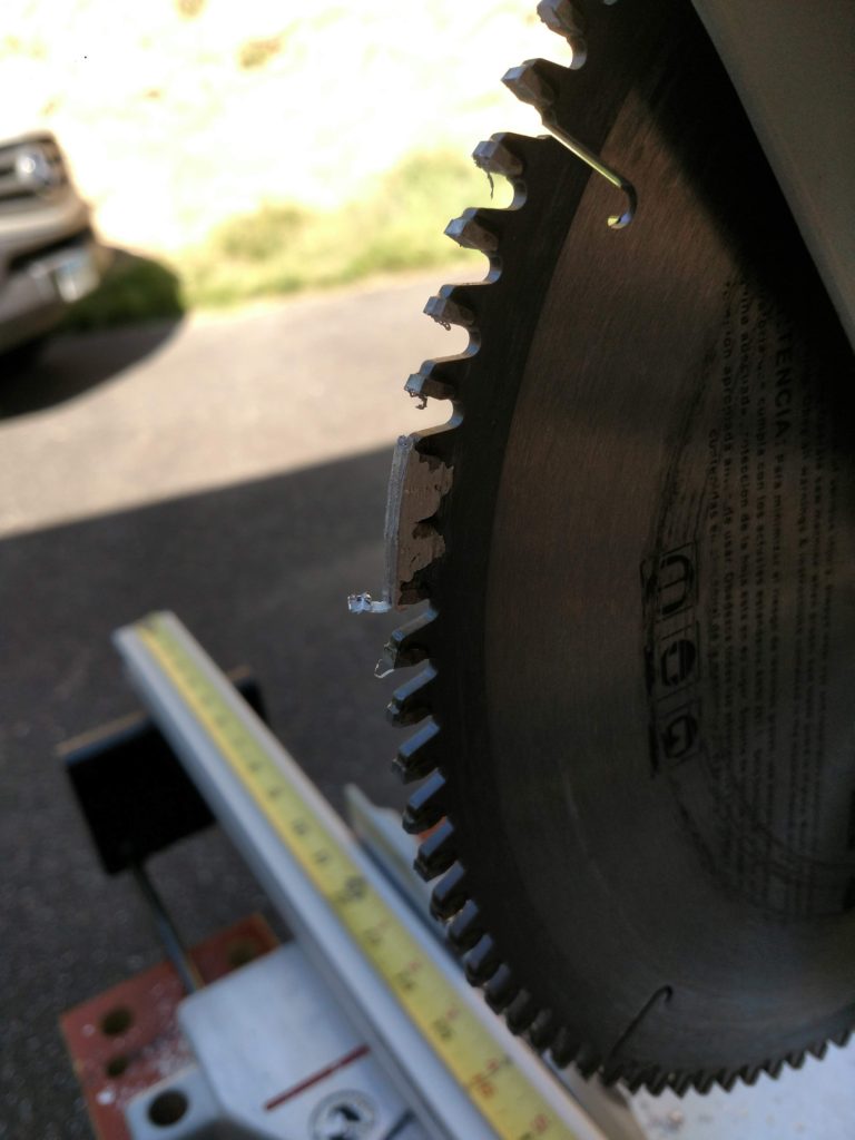 Miter saw blade fouled up while cutting aluminum extrusions