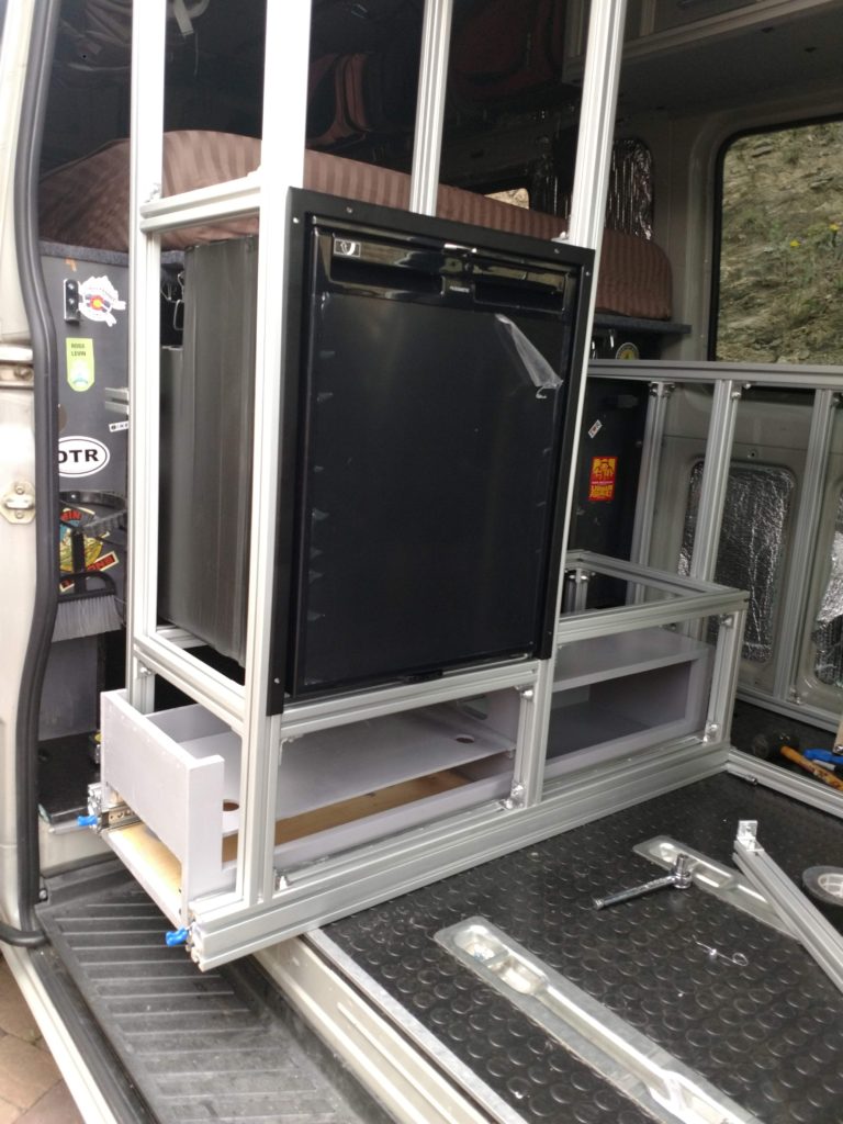 The 8020 structure is coming together and the kitchen unit is reinstalled